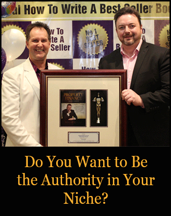 Image of Darren Stephens and Konrad Bobilak holding a plaque at an event