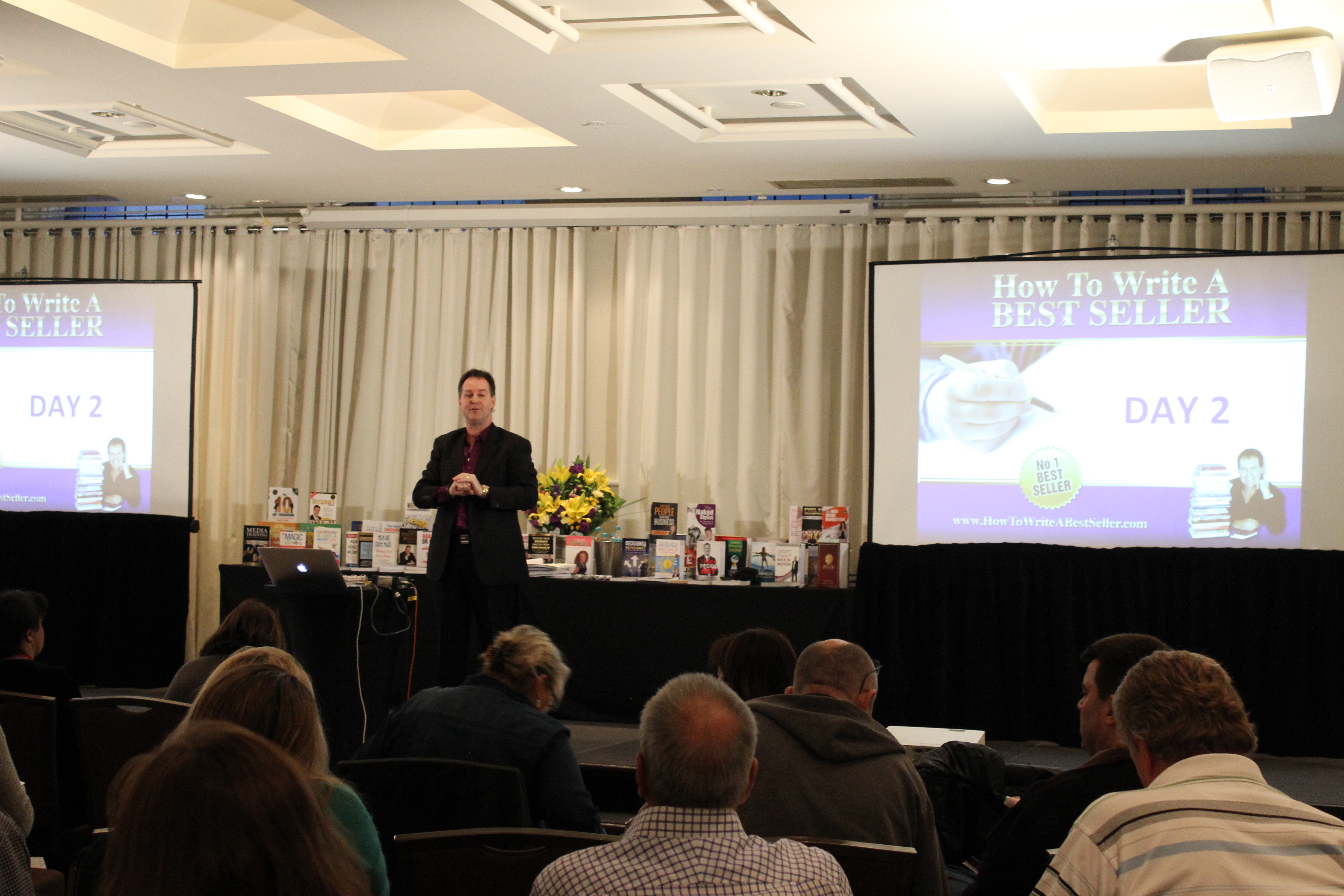 Image of Darren Stephens speaking to a crowd at an event